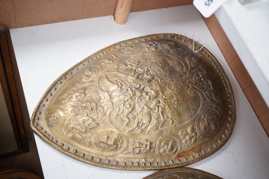 A reproduction bronze casting of the shield of Henry II of France, together with a coppered resin model of another shield, largest 59cm. Condition - fair to good